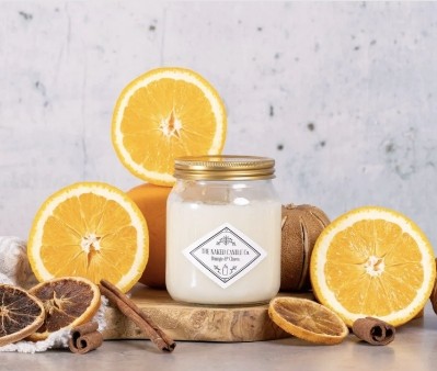 The Naked Candle Co Orange & Clove soy candle with spiced citrus, clove and warm autumnal notes.