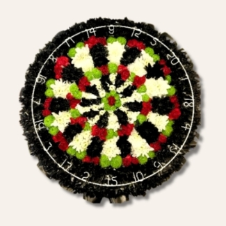 Dart board-shaped funeral tribute made with mixed chrysanthemum and finished with a genuine wired dart board surround, measuring approximately 20 inches.