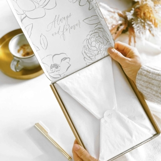 Blush & Gold Blush wedding planner with soft blush pink cover and gold detailing.