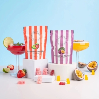 Ask Mummy & Daddy Passionfruit Martini cocktail gummies, palm-oil-free, gluten-free and dairy-free, in a purpe and white stripe gift pouch.